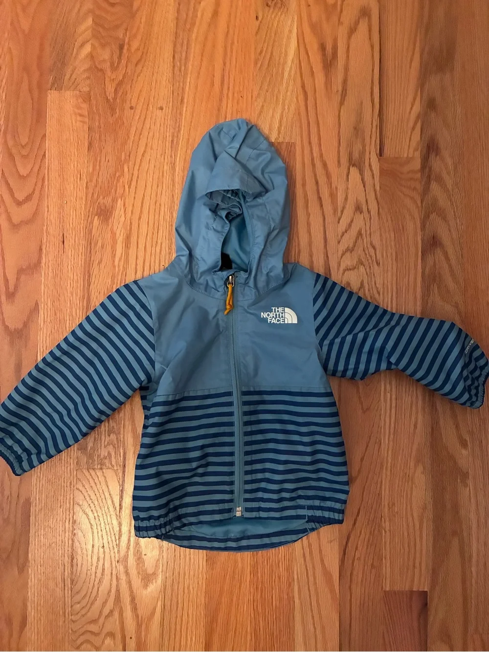 The North Face Infant ZIPLINE RAIN JACKET NIAGARA BLUE MINI STRIPE PRINT 6-12 mo